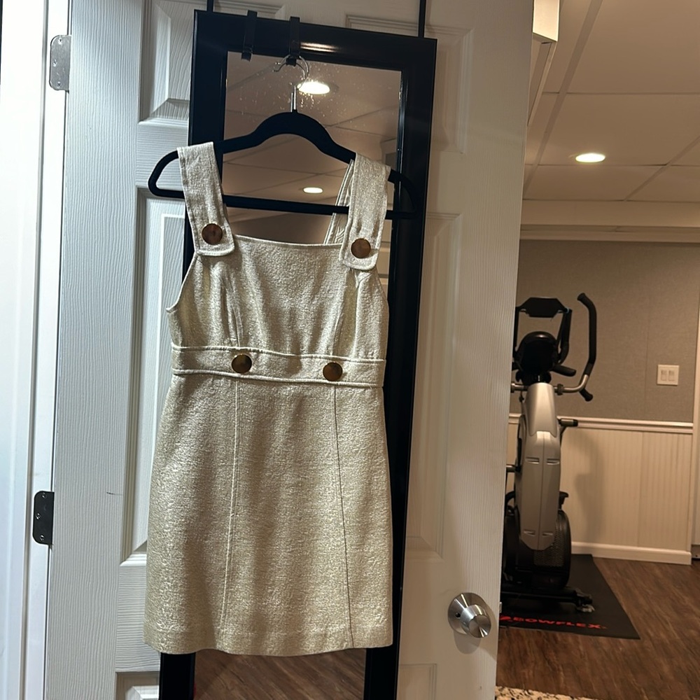 Bebe cream and gold foil illusion dress. Apron style with gold hardware buttons